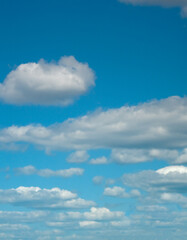 Naklejka na ściany i meble Beautiful blue sky with white clouds, copy space