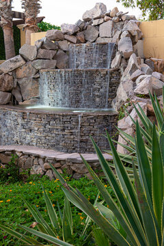 Side View, Home Water Fountain With Water Motion Blur. Concept Of Home Gardening