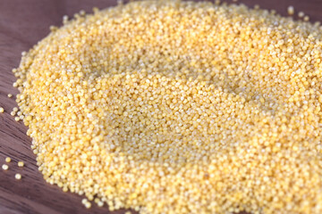One of the daily staple food millet grain on the cutting board