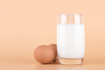A glass of milk and two boiled eggs