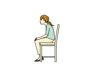 椅子に座っている猫背の女性