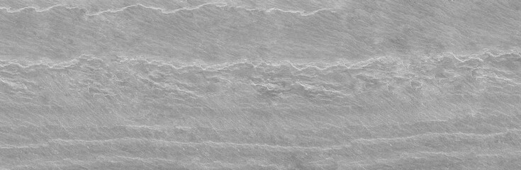 Panorama dark gray stone background with copy space. Black grunge banner with rock texture.