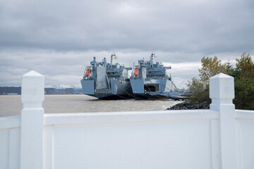 View of a two battleships anchored near the shore at Tacoma, Utah