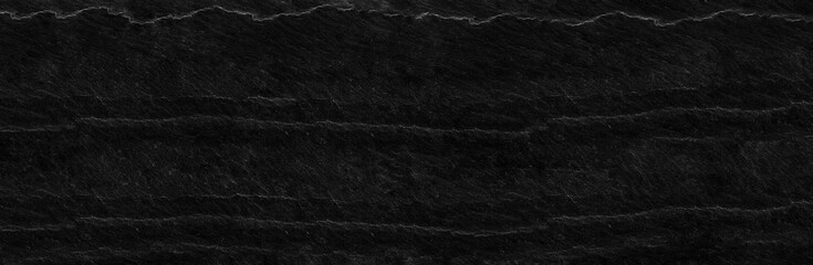 Panorama black lined marble stone background with copy space. Black grunge banner with rock texture