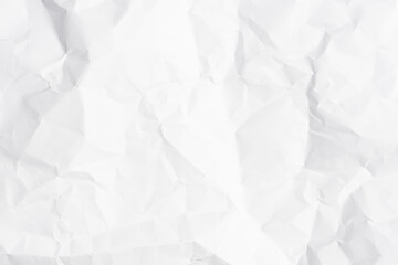 White crumpled paper texture background.