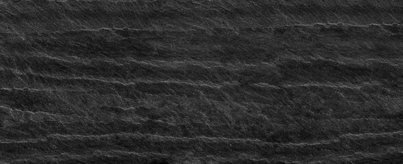 Panorama black lined marble stone background with copy space. Black grunge banner with rock texture.