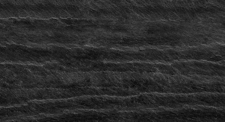 Black lined marble stone background with copy space. Black grunge banner with rock texture.