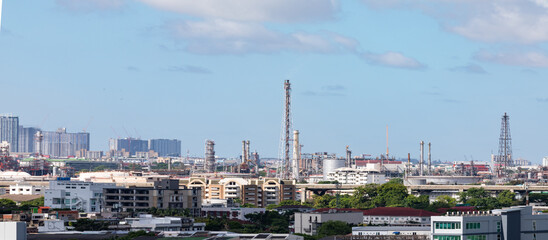 Fototapeta na wymiar BANGKOK-THAILAND-BANGKOK-THAILAND-JUNE 27, 2021 Aerial view of petrochemical oil refinery and sea in industrial engineering concept in Bangna district, Bangkok City in the city of Thailand, Thailand.