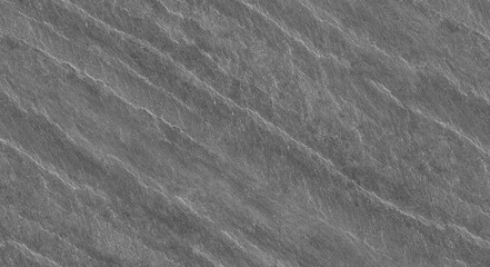 Abstract stone background. The texture of the stone wall. Close-up. Light gray rock backdrop