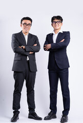 Two Asian businessman posing on white background