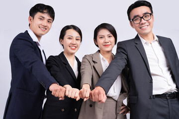 Group of Asian business people posing on a white background