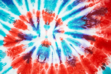 abstract rainbow spiral tie dye background.