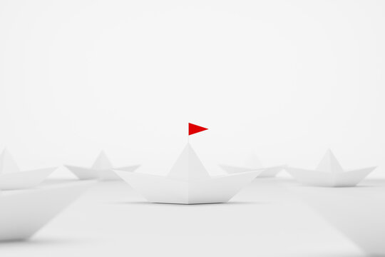 Leadership concept. Paper ship with red flag center among white on white background. 3d illustration