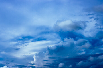 Saturated blue sky with heavy clouds