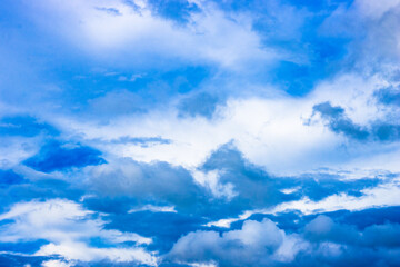 Fototapeta premium Blue sky with scattered clouds
