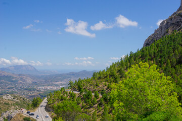 Fototapeta na wymiar Winding road and agricultural terraces through famous mountain range Coll de Rates