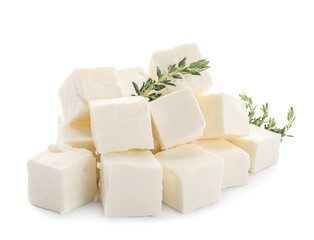 Pieces of delicious feta cheese with thyme on white background