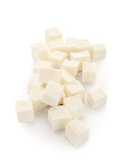 Pieces of delicious feta cheese on white background