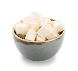 Bowl with pieces of feta cheese on white background