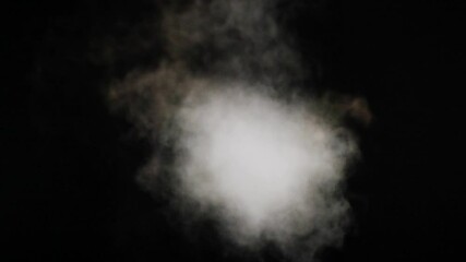Abstract smoke cloud, fog, vapor, steam isolated over black background, blanding