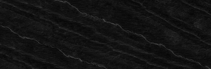Panorama black rock background. Dark gray stone texture. Black grunge background.