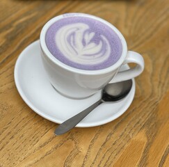 Purple Taro Latte Beautifully Presented with Impressive Latte Art