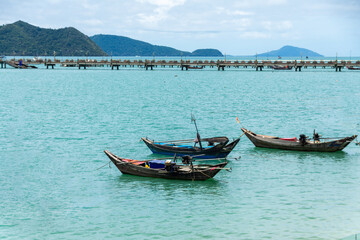 Obraz na płótnie Canvas beautiful sea summer with boat at Chalong bay, Phuket province, Thailand. subject is blurred and noise.