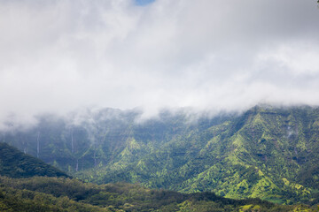 Green hills, waterfalls and mist at Halelea Forest Reserve, Kauai, Hawaii