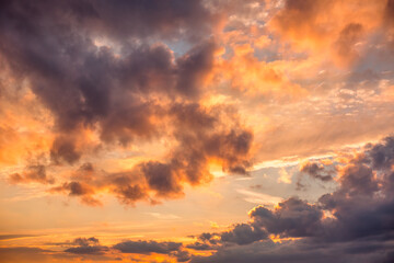 Fototapeta na wymiar Sunset dramatic sky clouds with sunbeam