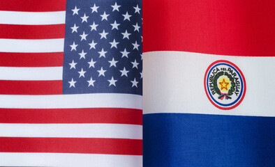 fragments of the national flags of the United States and the Republic of Paraguay in close-up