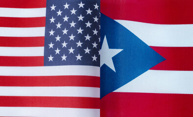 Obraz premium fragments of the national flags of the United States and Puerto Rico close-up
