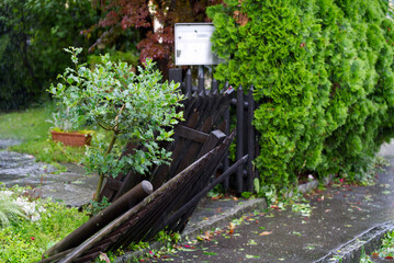 Broken wooden fence after nightly heavy summer thunderstorm at City of Zurich. Photo taken July 13th, 2021, Zurich, Switzerland.