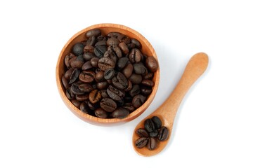 Coffee beans with wooden bowl and wooden spoon isolated on white background