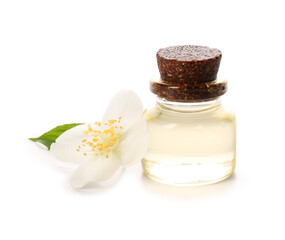 Bottle of essential oil and jasmine flower on white background