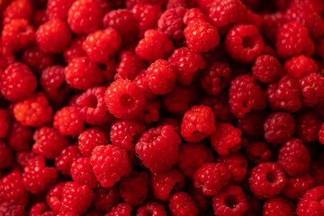 Ripe, juicy, tender and sweet raspberries as a background photo