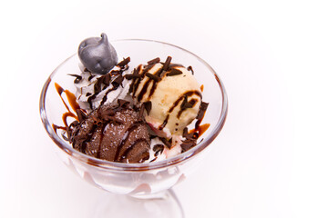 Selection of gourmet flavours of Italian ice cream scoops in sundae bowl isolated on white background.