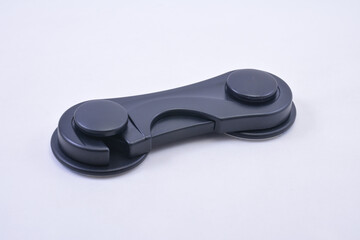 Plastic material swivel lock with adhesive at back use to put in side doors