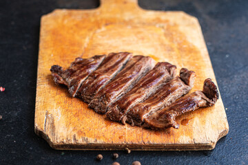 beef steak juicy meat grilled barbecue B-B-Q on the table, healthy meal snack copy space food background rustic top view 