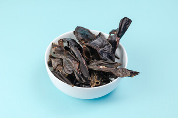 Training treats for pets on blue background. Natural Air Dried d