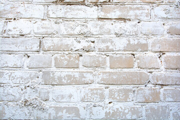 whitewashed weathered brick wall