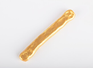 A gold bar on a white background