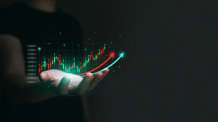 Businessman trader  is holding a growing virtual hologram stock.  Stock market cryptocurrency and investment concept. Business growth and strategy