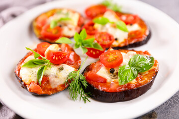 aubergine pizza with tomato sauce,  mozzarella and basil