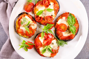 aubergine pizza with tomato sauce,  mozzarella and basil