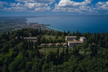 Monastery on the Eremo di San Giorgio hill,.Lake Garda, Italy. Aerial view of Eremo di San Giorgio,...