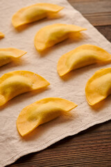 Raw homemade ravioli pasta with spinach and ricotta