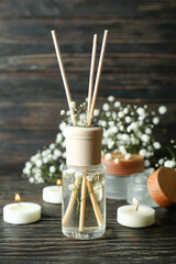 Aromatic concept with diffuser on wooden table