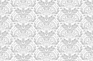 Wallpaper in the style of Baroque. Seamless vector background. White and gray floral ornament. Graphic pattern for fabric, wallpaper, packaging. Ornate Damask flower ornament.