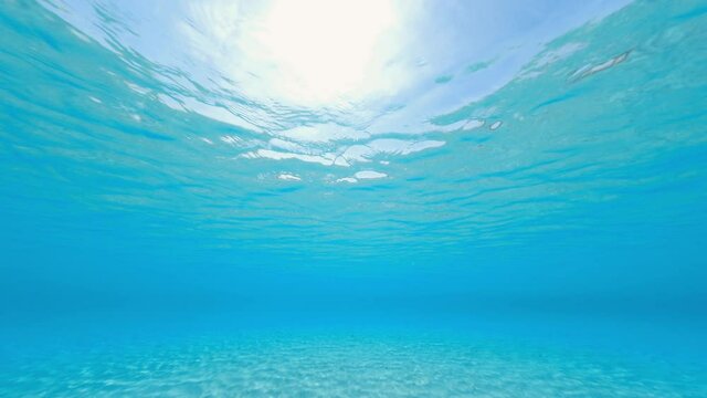 Underwater video, stunning view of a turquoise water forming a natural pattern. Caprera, La Maddalena Archipelago, Sardinia, Italy.