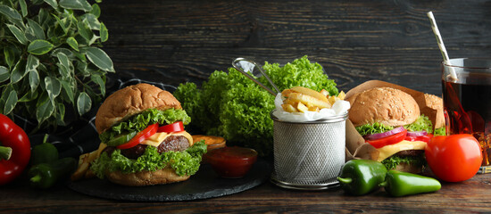 Concept of tasty food with delicious burgers